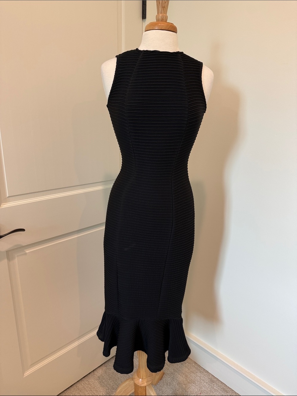 KENDALL + KYLIE Sleeveless Black Ribbed Midi Dress with Flounce Hem